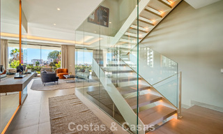 Minimalistische luxewoning met panoramisch zeezicht te koop in een prestigieus gated complex in Nueva Andalucia, Marbella 788627 