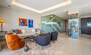 Minimalistische luxewoning met panoramisch zeezicht te koop in een prestigieus gated complex in Nueva Andalucia, Marbella 788629 