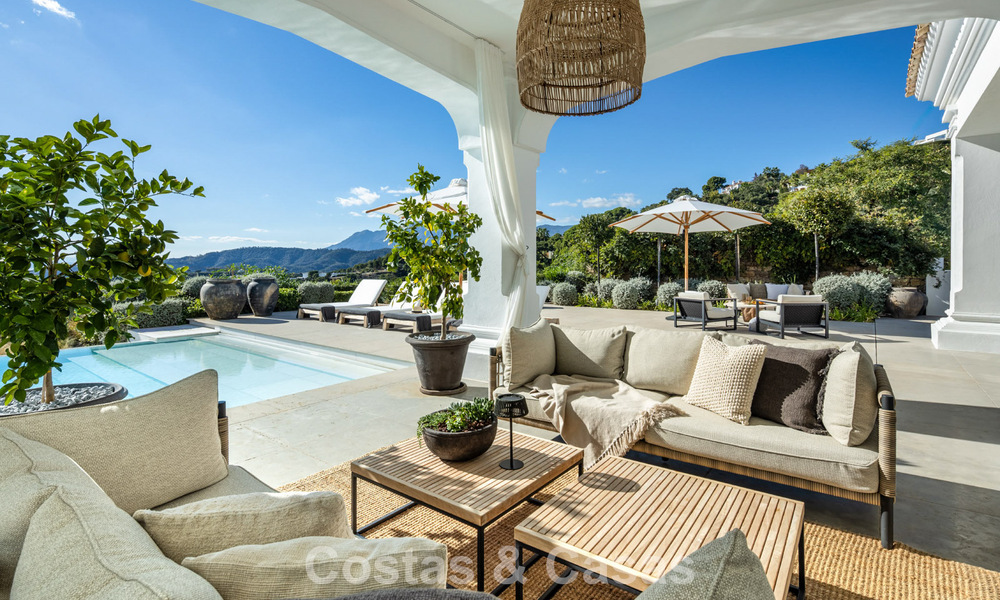 Mediterrane luxevilla met een klassieke architectuur te koop en zeezicht in het Marbella Club Resort in Benahavis 790368