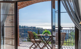 Verzorgd Mediterraan appartement met golf- en zeezicht te koop in een golfresort in de heuvels van Marbella - Benahavis 790921 