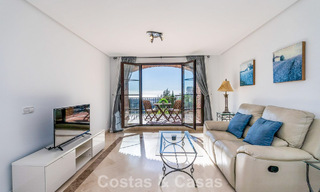 Verzorgd Mediterraan appartement met golf- en zeezicht te koop in een golfresort in de heuvels van Marbella - Benahavis 790925 