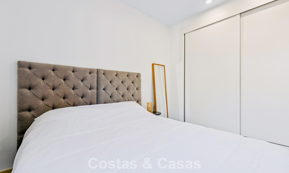 Tuinappartement met zeezicht te koop in een gated complex in Marbella - Benahavis 791255