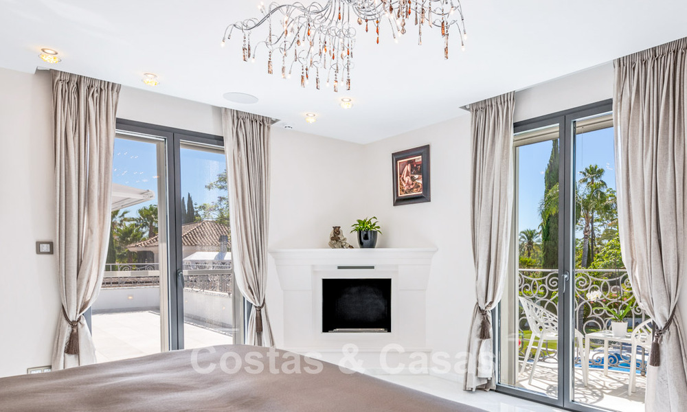 Exclusieve villa te koop, aan de golfbaan in een prestigieuze urbanisatie in Nueva Andalucia, Marbella 791424