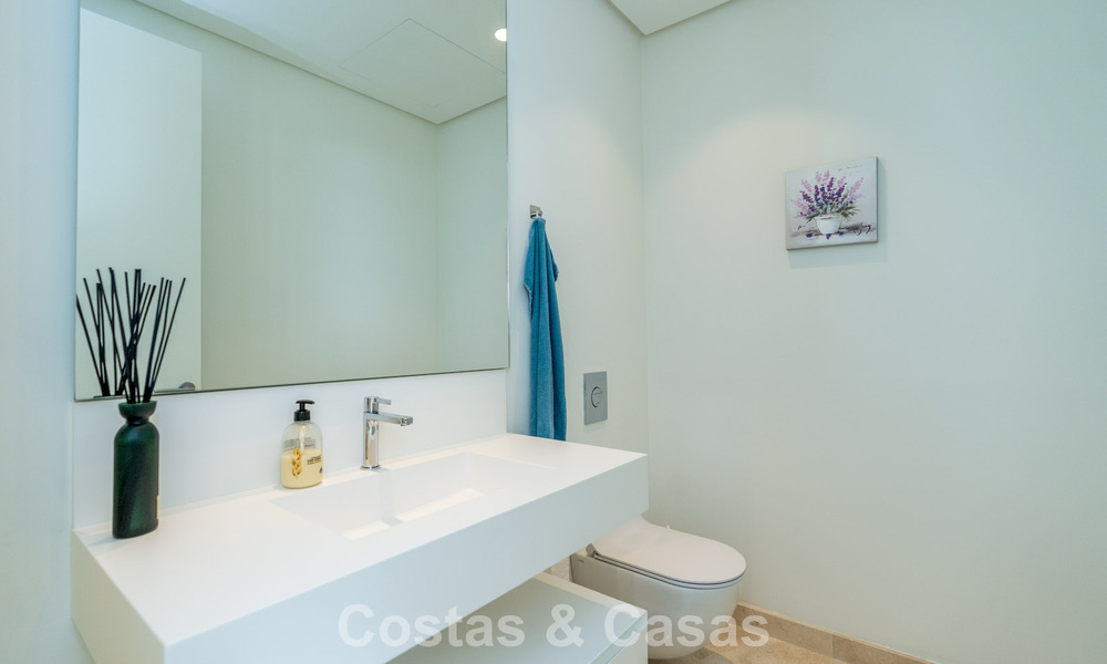 Luxueus 3-slaapkamer appartement te koop met panoramisch zeezicht in een gated resort in Marbella - Benahavis 791548