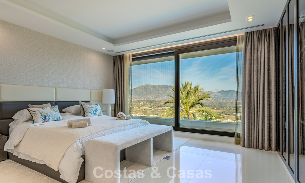 Gloednieuwe, moderne luxevilla met zeezicht te koop in een golfresort in Mijas, Costa del Sol 791696