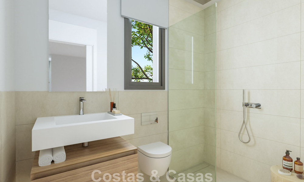 Eigentijdse townhouses met hedendaags ontwerp te koop in een golfomgeving van Mijas Costa, Costa del Sol 791826