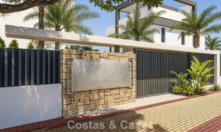 Eigentijdse townhouses met hedendaags ontwerp te koop in een golfomgeving van Mijas Costa, Costa del Sol 791834 