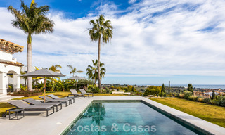 Instapklare, eigentijds-mediterrane villa met onverstoord, panoramisch zeezicht te koop in Benahavis - Marbella 793446 