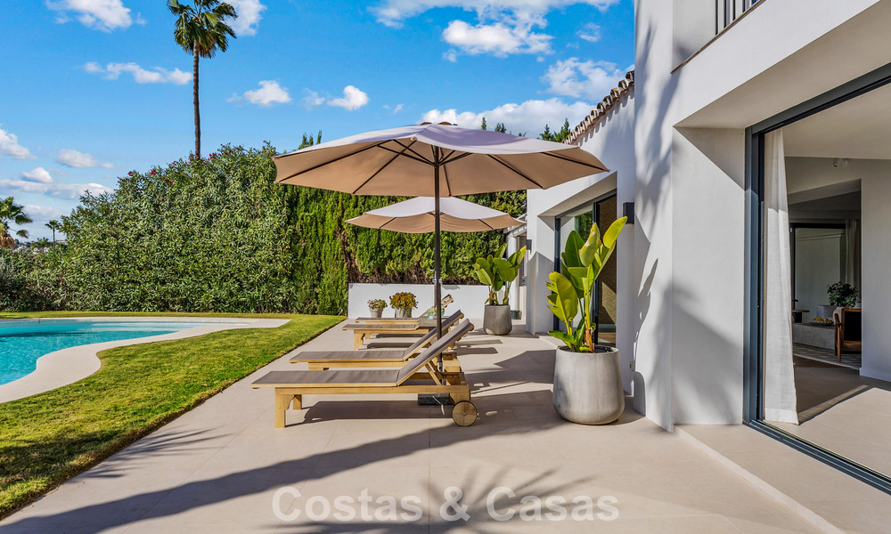 Hoogwaardig gerenoveerde familievilla te koop in de gewilde golfomgeving van Nueva Andalucia, Marbella 793190