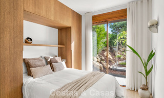 Elegant duplex appartement met privétuin te koop, direct aan de golfbaan in Nueva Andalucía, Marbella 793118 