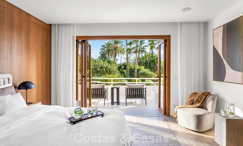 Elegant duplex appartement met privétuin te koop, direct aan de golfbaan in Nueva Andalucía, Marbella 793126