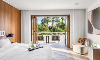 Elegant duplex appartement met privétuin te koop, direct aan de golfbaan in Nueva Andalucía, Marbella 793126 