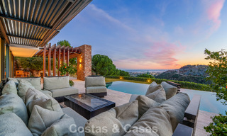 Moderne architecturale villa met zeezicht en een professionele gym te koop in El Madroñal, Benahavís - Marbella 793719 