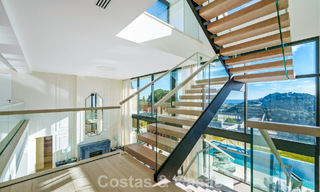 Moderne architecturale villa met zeezicht en een professionele gym te koop in El Madroñal, Benahavís - Marbella 793745 