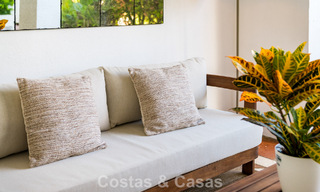 Stijlvol appartement met privétuin te koop in een gated community in Sierra Blanca, Marbella 793875 