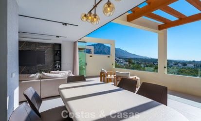 Gerenoveerd luxe appartement met zeezicht te koop in het begeerde Nueva Andalucia, Marbella 794131