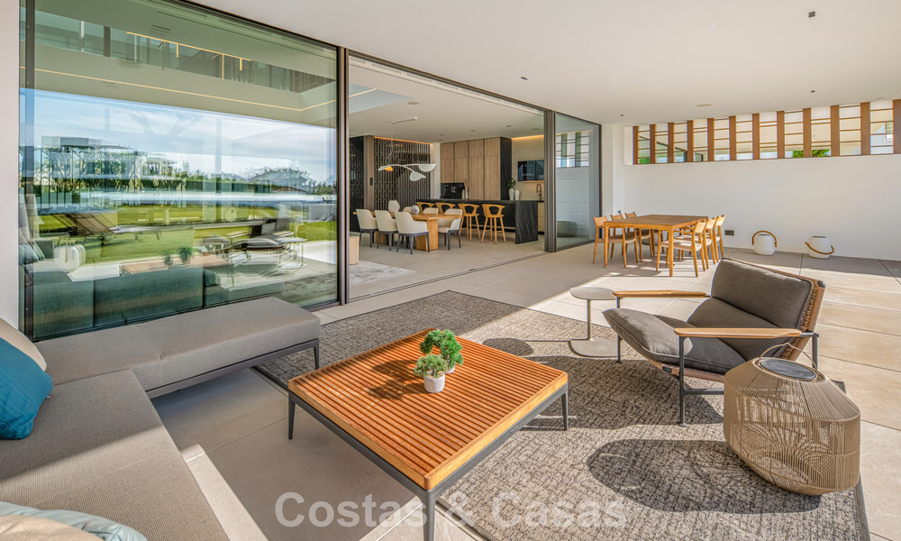 Ultramoderne halfvrijstaande villa met privétuin en -zwembad te koop aan de Golden Mile, Marbella 795011