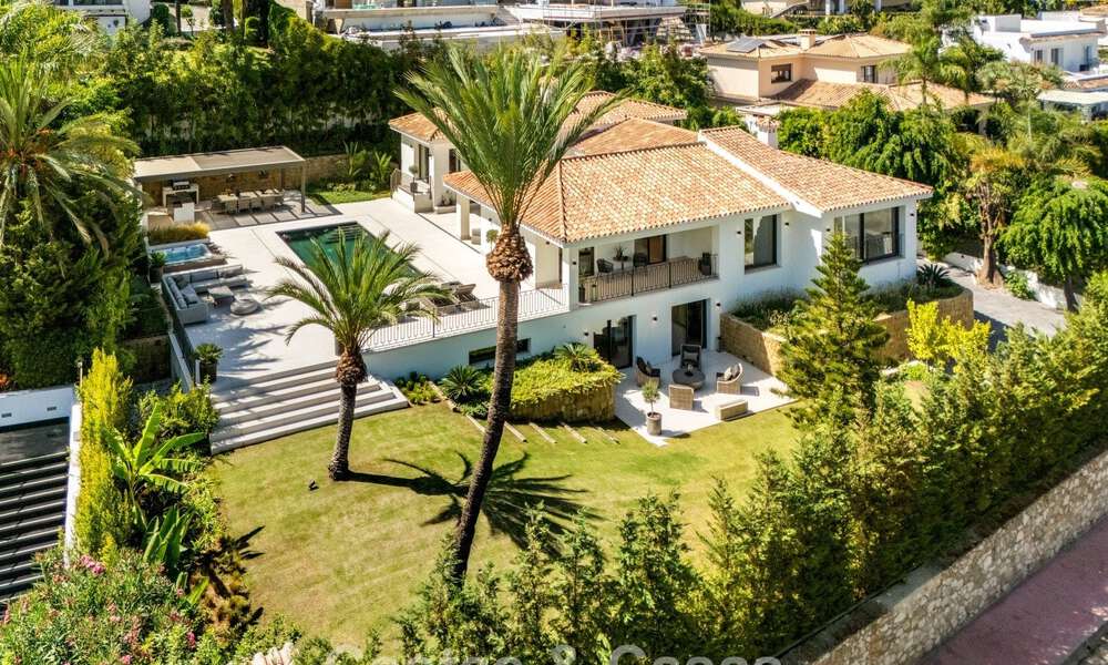 Elegante designvilla met panoramisch uitzicht te koop over de golfvallei van Nueva Andalucia, Marbella 795661