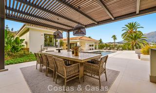 Elegante designvilla met panoramisch uitzicht te koop over de golfvallei van Nueva Andalucia, Marbella 795676 