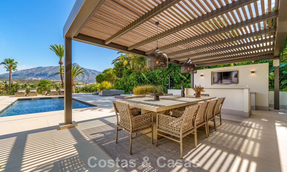 Elegante designvilla met panoramisch uitzicht te koop over de golfvallei van Nueva Andalucia, Marbella 795698