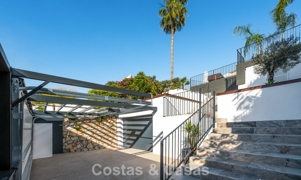 Exclusieve, architecturale villa met panoramisch golf- en zeezicht te koop in Nueva Andalucia, Marbella 796374