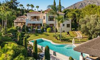 Opmerkelijke, Spaanse luxevilla met zeezicht te koop in een groene oase aan de Golden Mile van Marbella 798177 