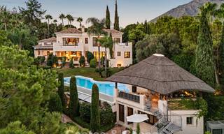 Opmerkelijke, Spaanse luxevilla met zeezicht te koop in een groene oase aan de Golden Mile van Marbella 798181 
