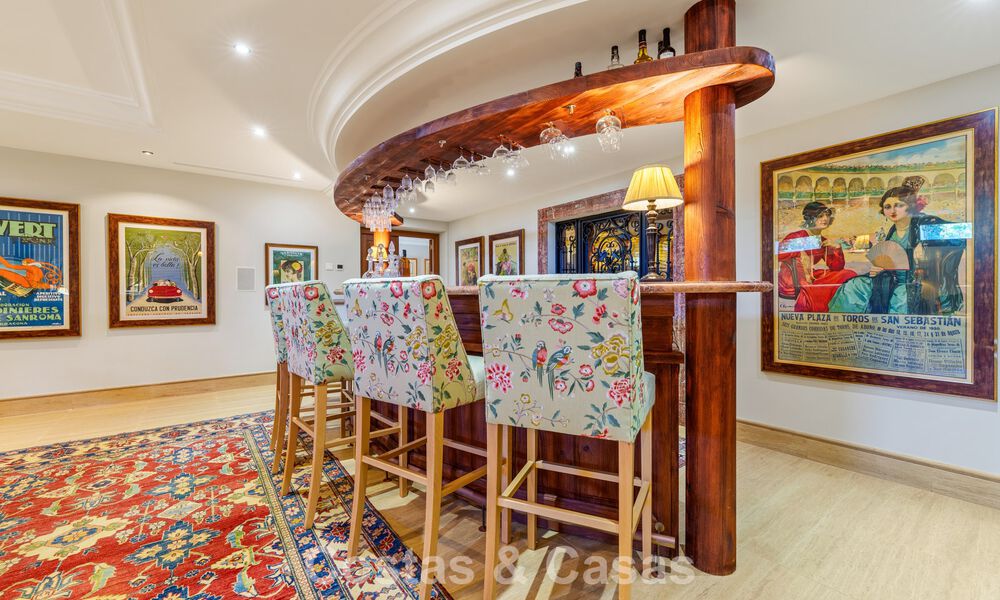 Opmerkelijke, Spaanse luxevilla met zeezicht te koop in een groene oase aan de Golden Mile van Marbella 798214