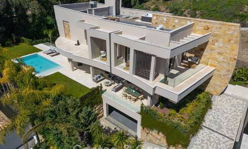 Geavanceerde designvilla te koop op een steenworp van de golfbaan, in het hart- van Nueva Andalucia, Marbella 798451