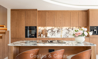 Luxe design townhouse met panoramisch zeezicht te koop in La Quinta, Marbella - Benahavis 798634 
