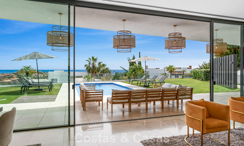 Modern-hedendaagse villa met panoramisch zeezicht te koop in een begeerde golfwijk in Marbella - Benahavis 798866