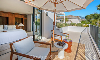 Instapklare, hedendaagse Mediterrane villa te koop grenzend aan de golfbaan van Las Brisas in Nueva Andalucia, Marbella 799115 