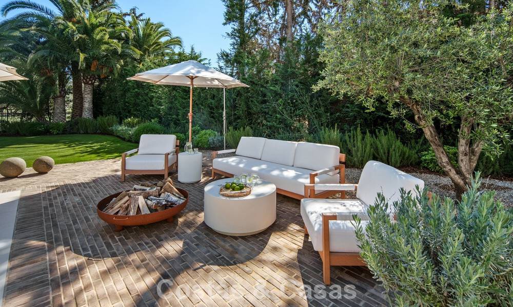 Instapklare, hedendaagse Mediterrane villa te koop grenzend aan de golfbaan van Las Brisas in Nueva Andalucia, Marbella 799124