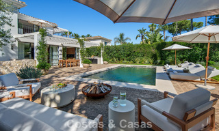 Instapklare, hedendaagse Mediterrane villa te koop grenzend aan de golfbaan van Las Brisas in Nueva Andalucia, Marbella 799126 