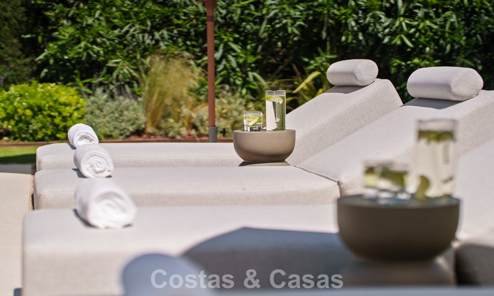 Instapklare, hedendaagse Mediterrane villa te koop grenzend aan de golfbaan van Las Brisas in Nueva Andalucia, Marbella 799174
