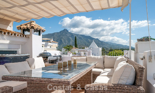 Prachtige rijwoning met panoramisch uitzicht te koop op loopafstand van talloze voorzieningen in Nueva Andalucia, Marbella 799508 