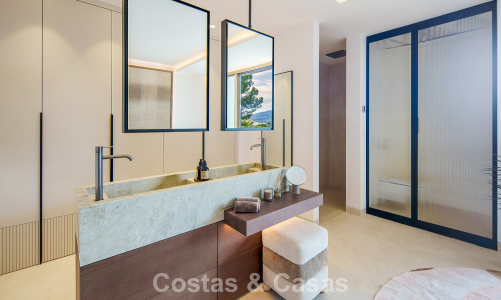 Hedendaagse design villa met panoramisch uitzicht te koop in Nueva Andalucia’s golfvallei, Marbella 800152
