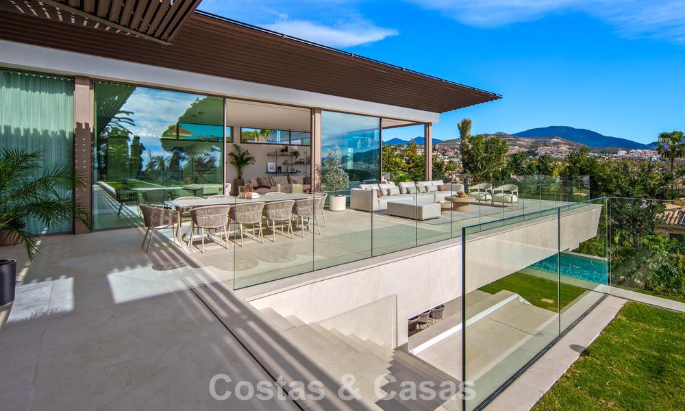 Hedendaagse design villa met panoramisch uitzicht te koop in Nueva Andalucia’s golfvallei, Marbella 800168