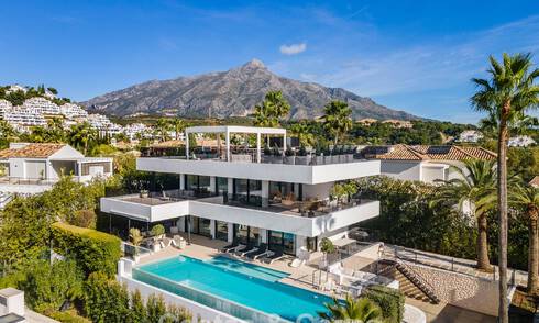 Gesofisticeerde luxevilla te koop met panoramisch uitzicht in Nueva Andalucia’s begeerde golfvallei, Marbella 800333