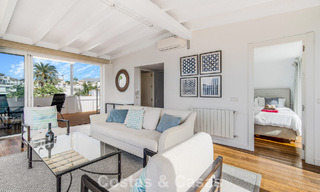 Prachtig gerenoveerd herenhuis met 4 slaapkamers te koop met zeezicht, eerstelijnsstrand op Marbella’s Golden Mile 800853 