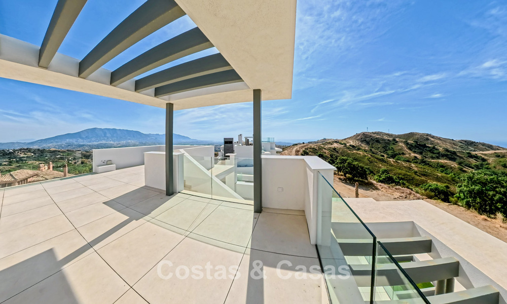 Moderne nieuwbouwappartementen met panoramisch zeezicht te koop nabij Elviria, Marbella Oost 802030