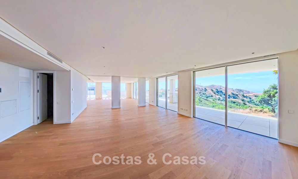 Moderne nieuwbouwappartementen met panoramisch zeezicht te koop nabij Elviria, Marbella Oost 802034