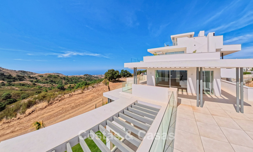 Moderne nieuwbouwappartementen met panoramisch zeezicht te koop nabij Elviria, Marbella Oost 802038