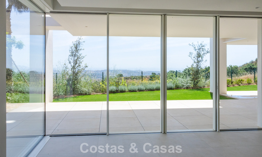 Moderne nieuwbouwappartementen met panoramisch zeezicht te koop nabij Elviria, Marbella Oost 802054