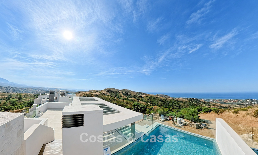 Moderne nieuwbouwappartementen met panoramisch zeezicht te koop nabij Elviria, Marbella Oost 802058