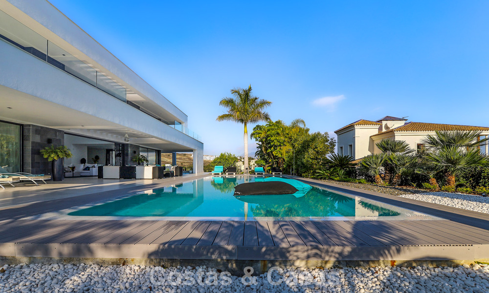 Exclusieve eigentijdse villa met panoramisch zeezicht te koop in Los Flamingos een 5* golfresort in Marbella - Benahavis 804757