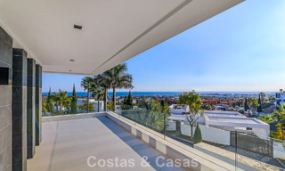 Exclusieve eigentijdse villa met panoramisch zeezicht te koop in Los Flamingos een 5* golfresort in Marbella - Benahavis 804762 