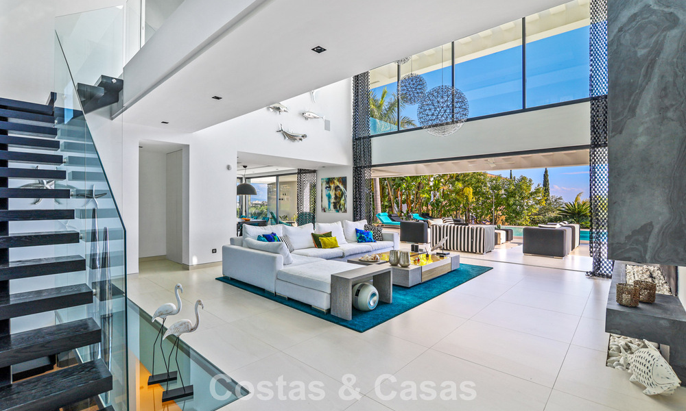 Exclusieve eigentijdse villa met panoramisch zeezicht te koop in Los Flamingos een 5* golfresort in Marbella - Benahavis 804764