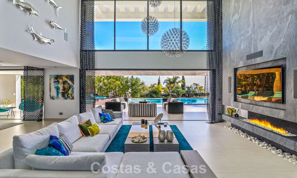 Exclusieve eigentijdse villa met panoramisch zeezicht te koop in Los Flamingos een 5* golfresort in Marbella - Benahavis 804765