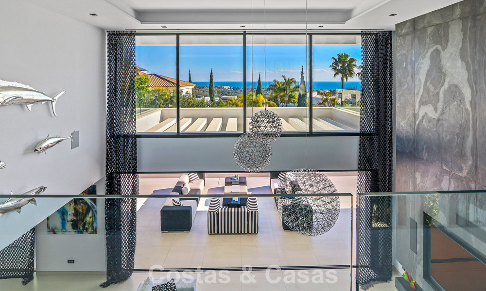 Exclusieve eigentijdse villa met panoramisch zeezicht te koop in Los Flamingos een 5* golfresort in Marbella - Benahavis 804777